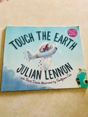 Touch the Earth by Julian Lennon - Light Blue Kids Picture Book